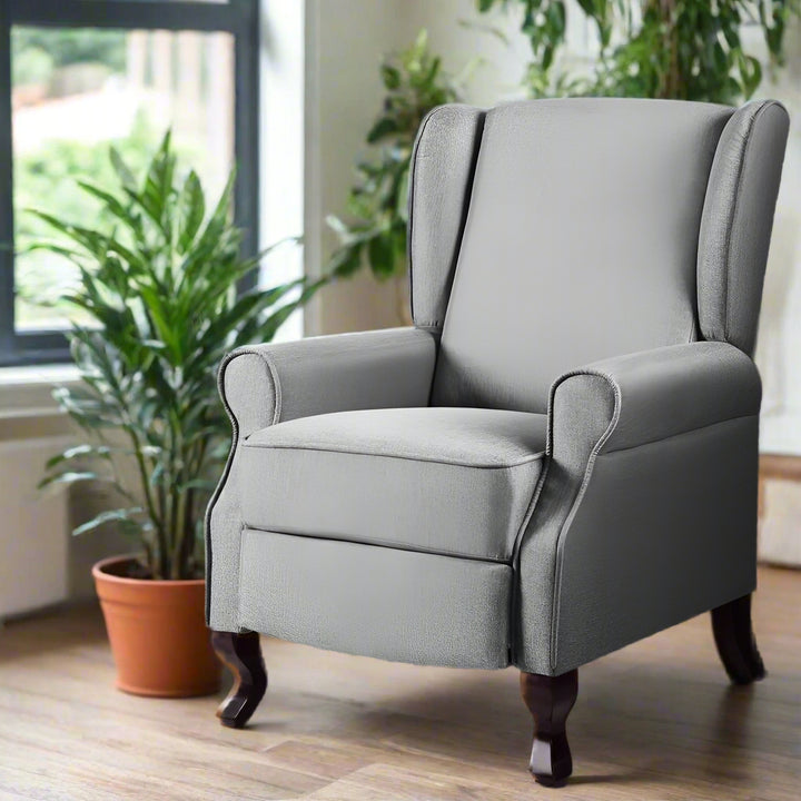 Gray armchair in a room with Adjustable back and leg rest
110-135 degree adjustable range
Sturdy steel base
Comfortable armrests
Solid wood legs